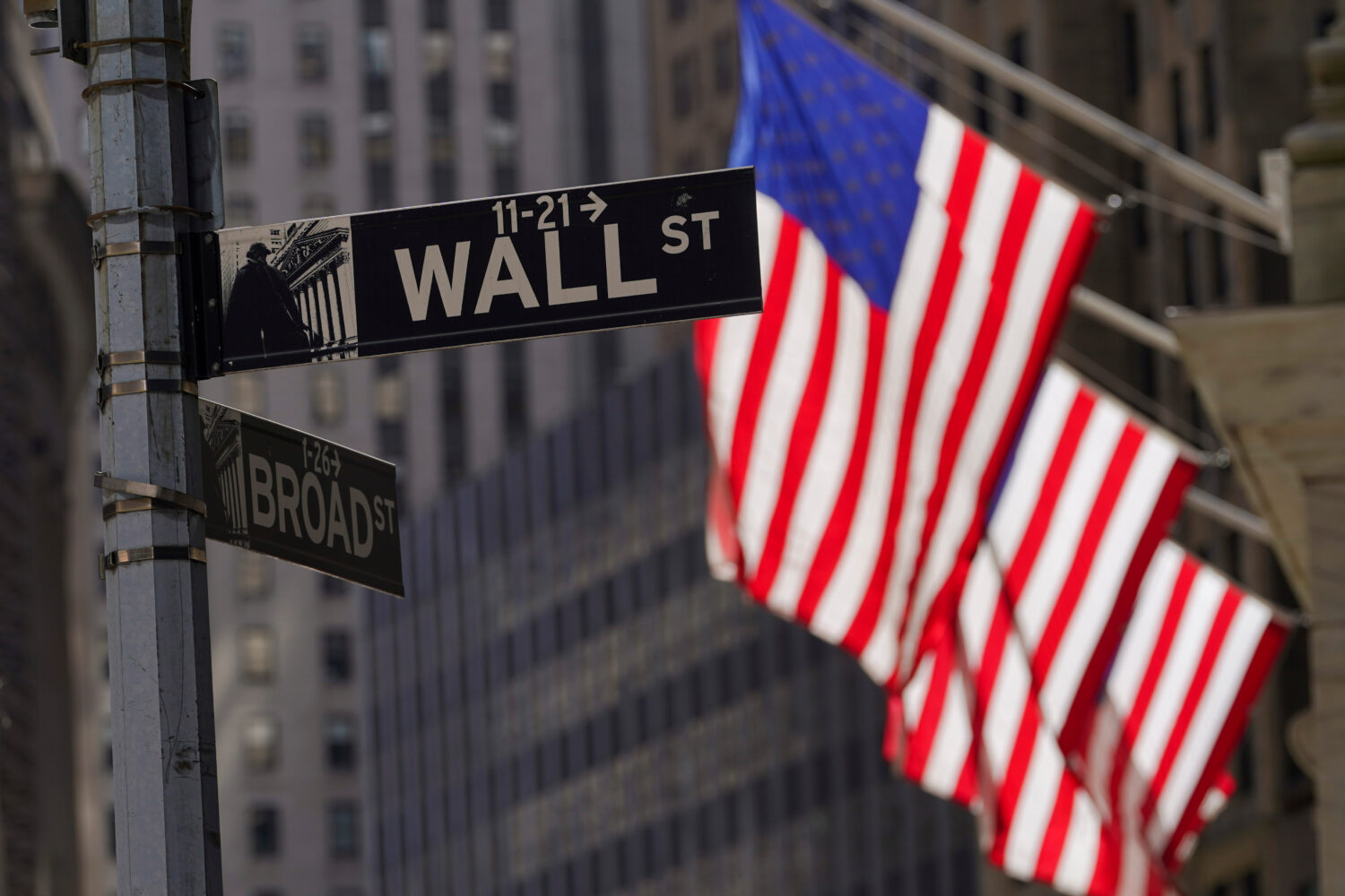 FILE - American flags fly outside the New York Stock Exchange, Friday, Sept. 23, 2022, in New York....