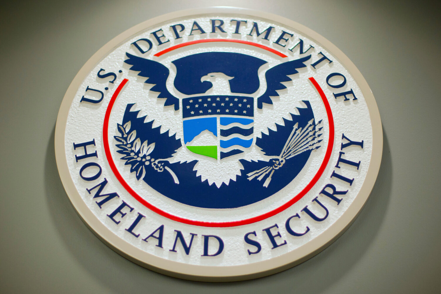 FILE - The Department of Homeland Security logo during a news conference in Washington, Feb. 25, 20...
