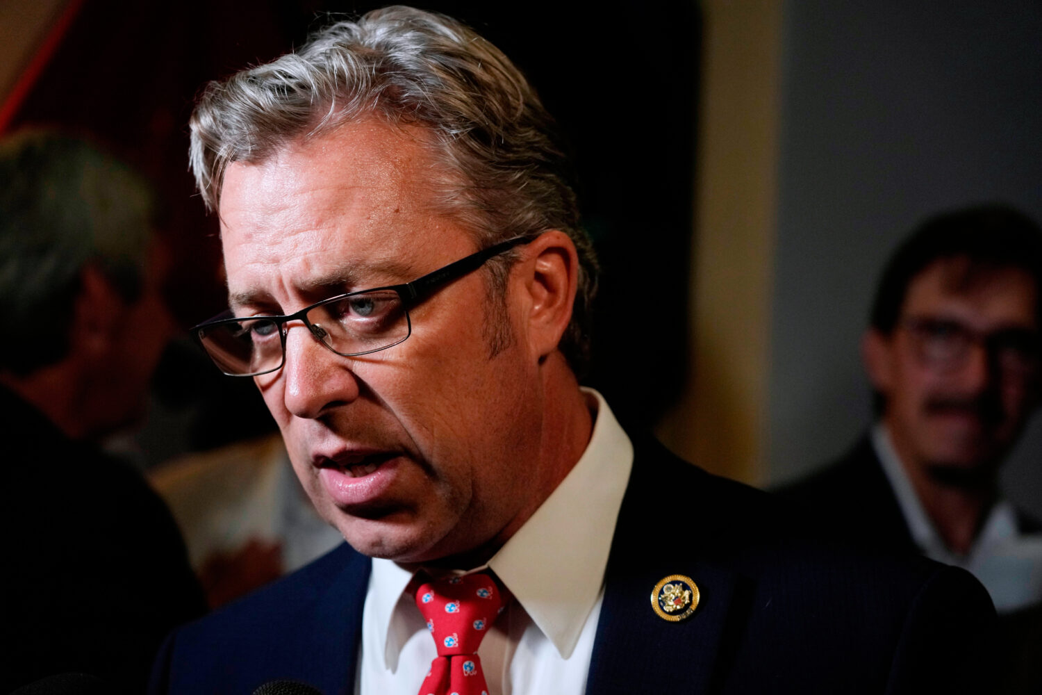 FILE - Rep. Andy Ogles, R-Tenn., speaks to supporters after being declared the winner in his Republ...