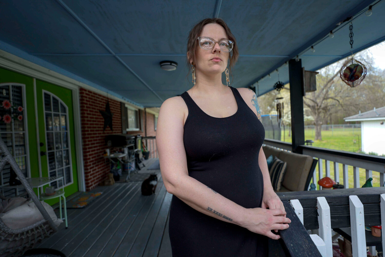 Stormy Bost stands on her porch in Calhoun, Ga., on March 29, 2026. (Miguel Martinez/Atlanta Journa...
