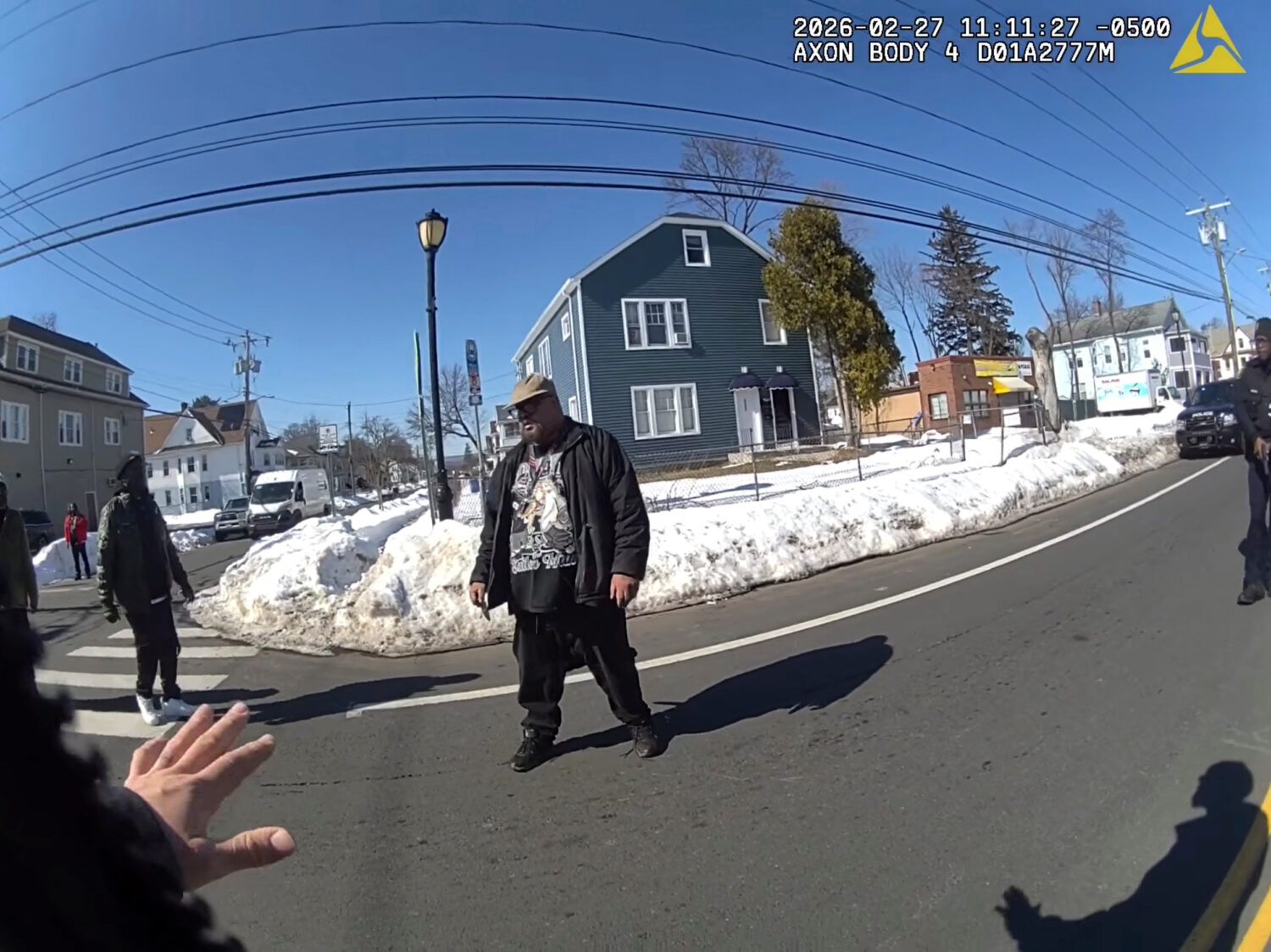FILE - This photo taken from Hartford Police body camera video shows Steven Jones, center, as polic...