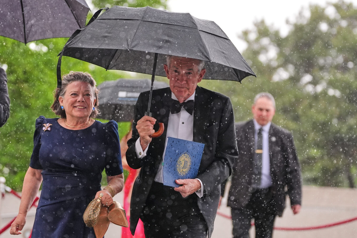 Federal Reserve Board Governor Jerome Powell, the former Federal Reserve chair, center, arrives wit...