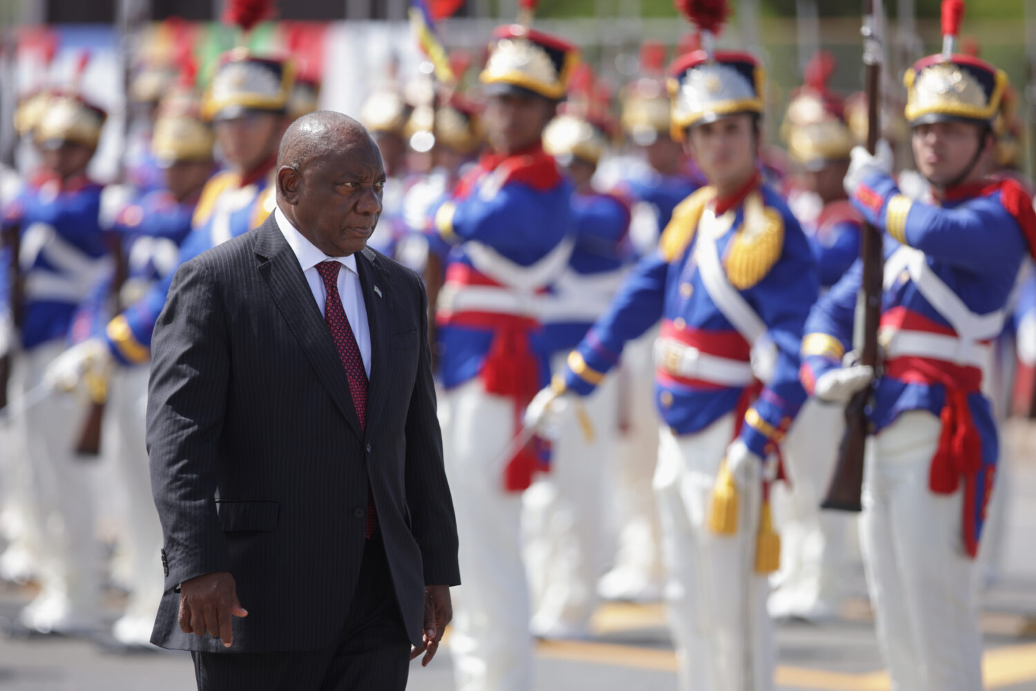 FILE - South Africa's President Cyril Ramaphosa receives military honors during a welcome ceremony ...