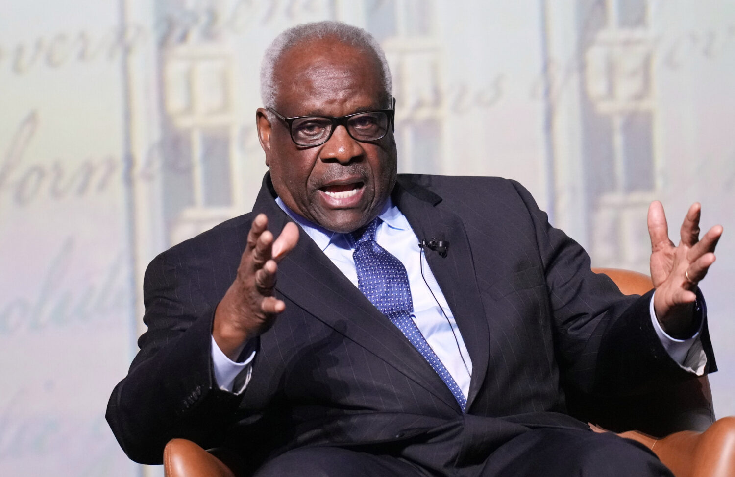 FILE - U.S. Supreme Court Associate Justice Clarence Thomas answers questions during a visit to the...