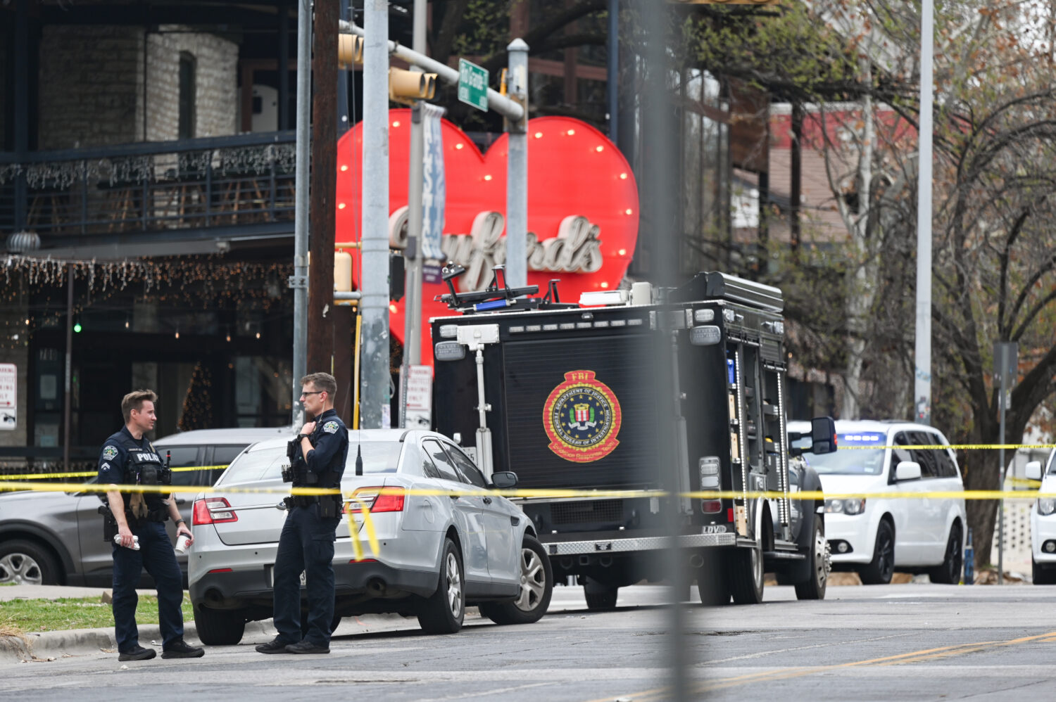 FILE - The Austin Police Department and the FBI investigate a shooting at Buford's on 6th Street on...