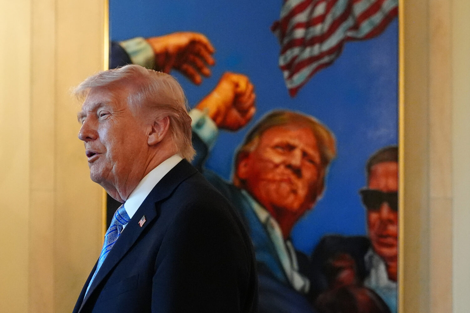 President Donald Trump talks with small business owners in the Grand Foyer of the White House, Mond...
