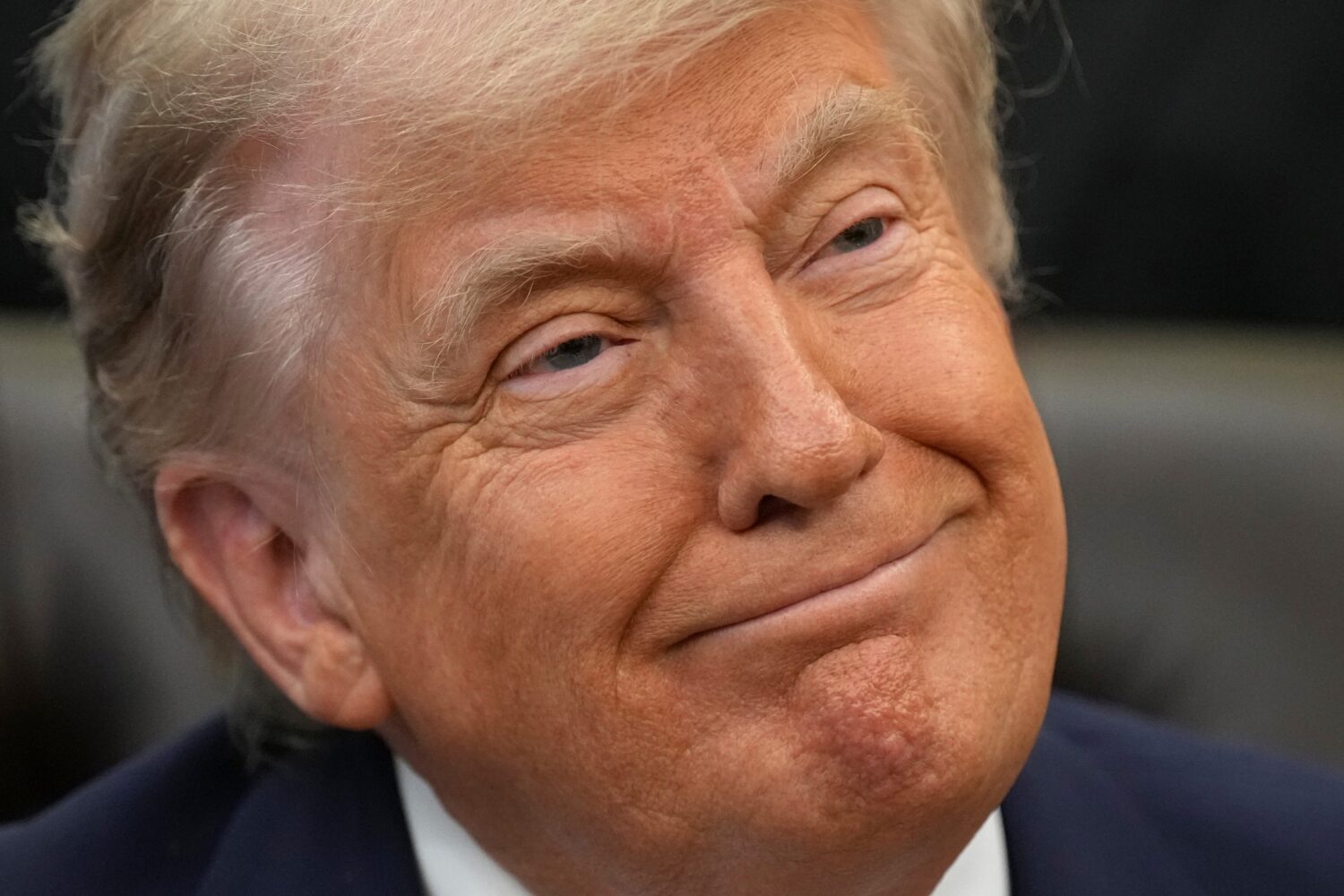 President Donald Trump attends an event about loosening a federal refrigerant rule, in the Oval Off...