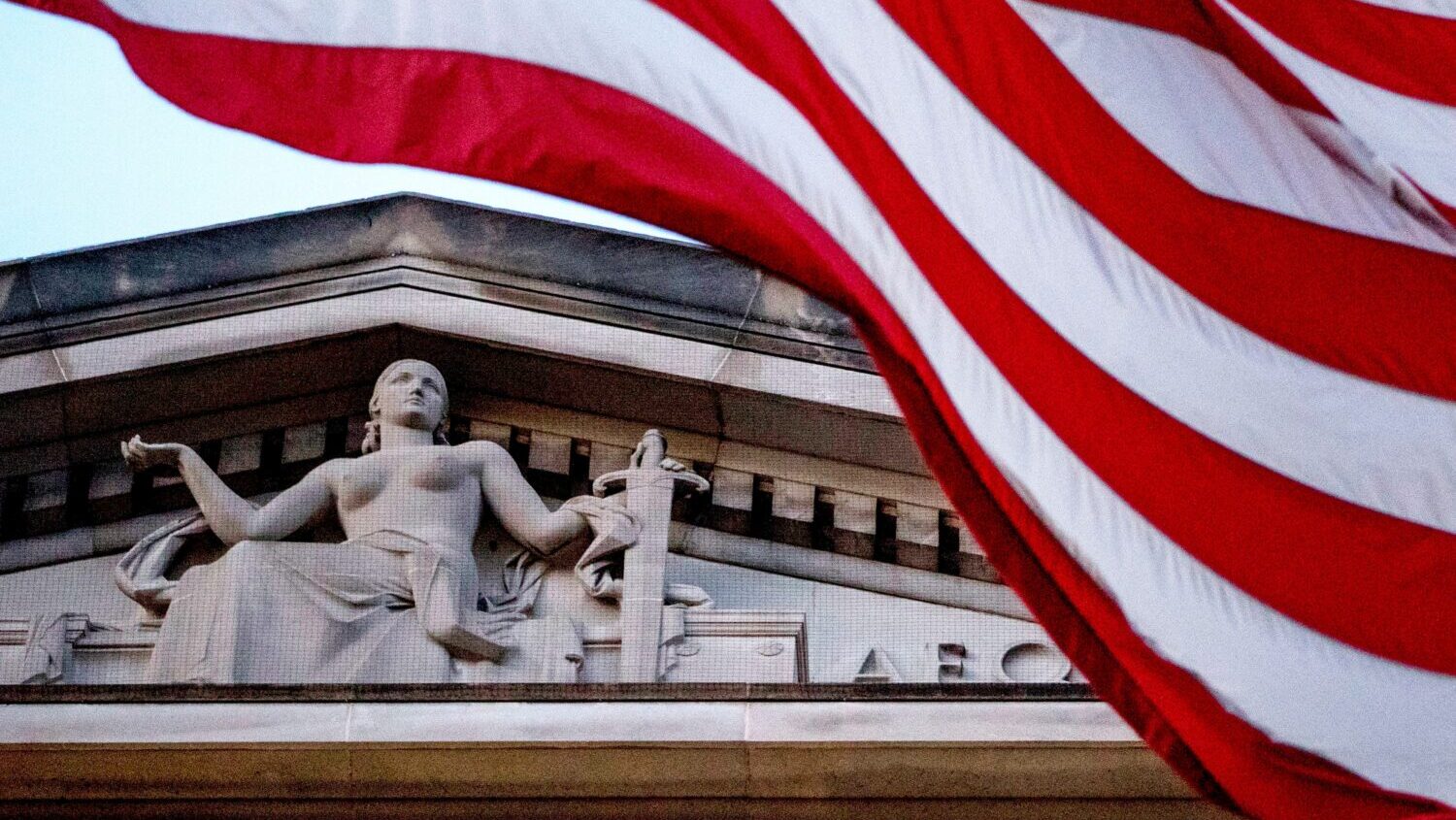 A federal judge temporarily blocked any payouts from the Trump administration’s $1.8 billion “a...