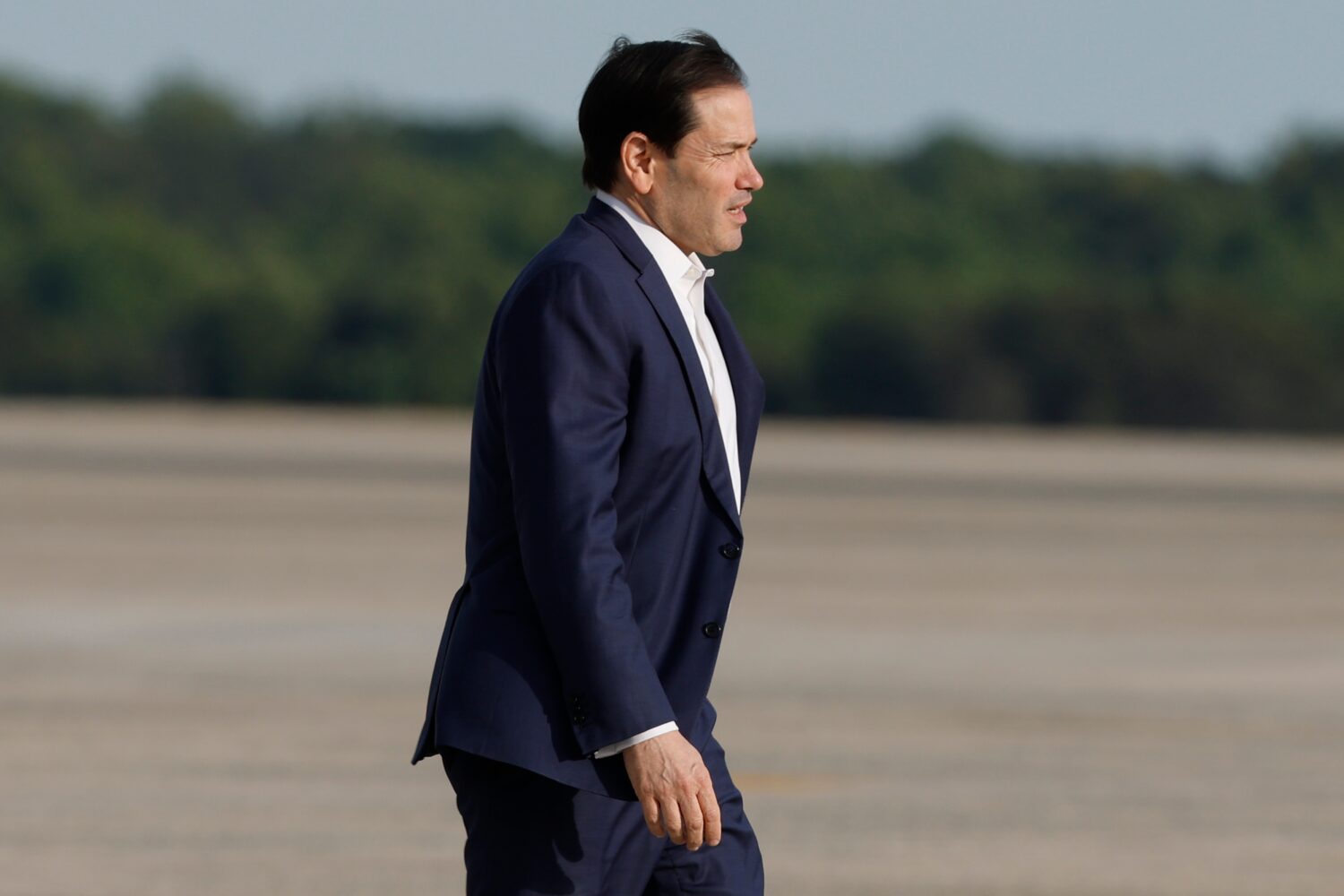 Secretary of State Marco Rubio departs Air Force One upon President Trump's arrival at Joint Base A...