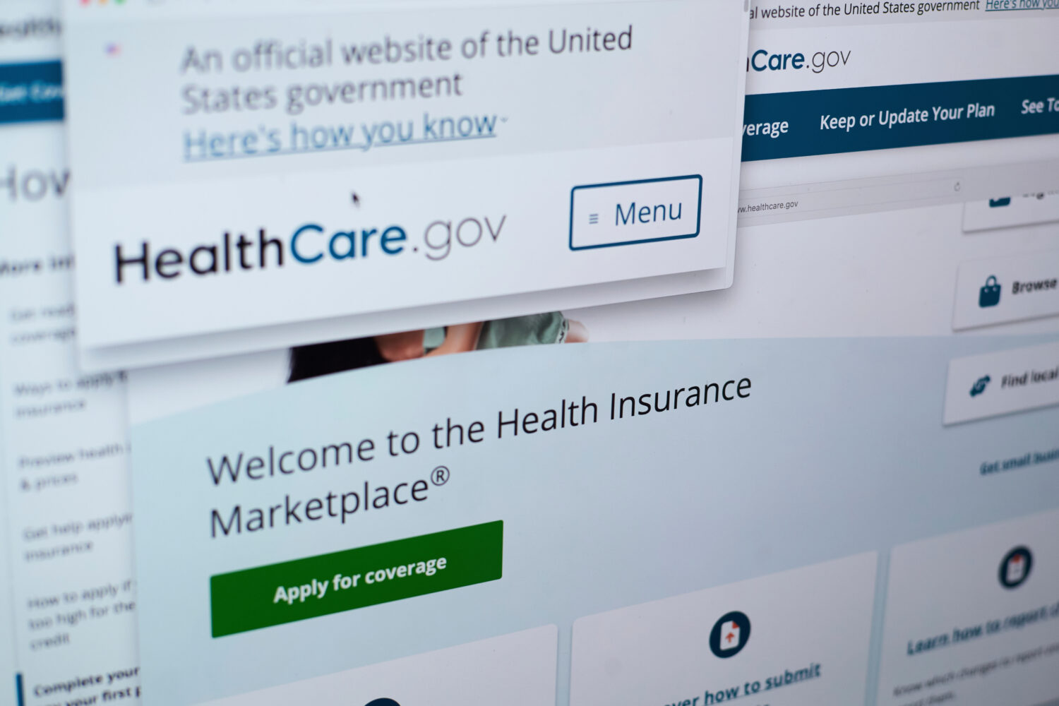 FILE - Pages from the U.S. Affordable Care Act health insurance website, healthcare.gov, are displa...