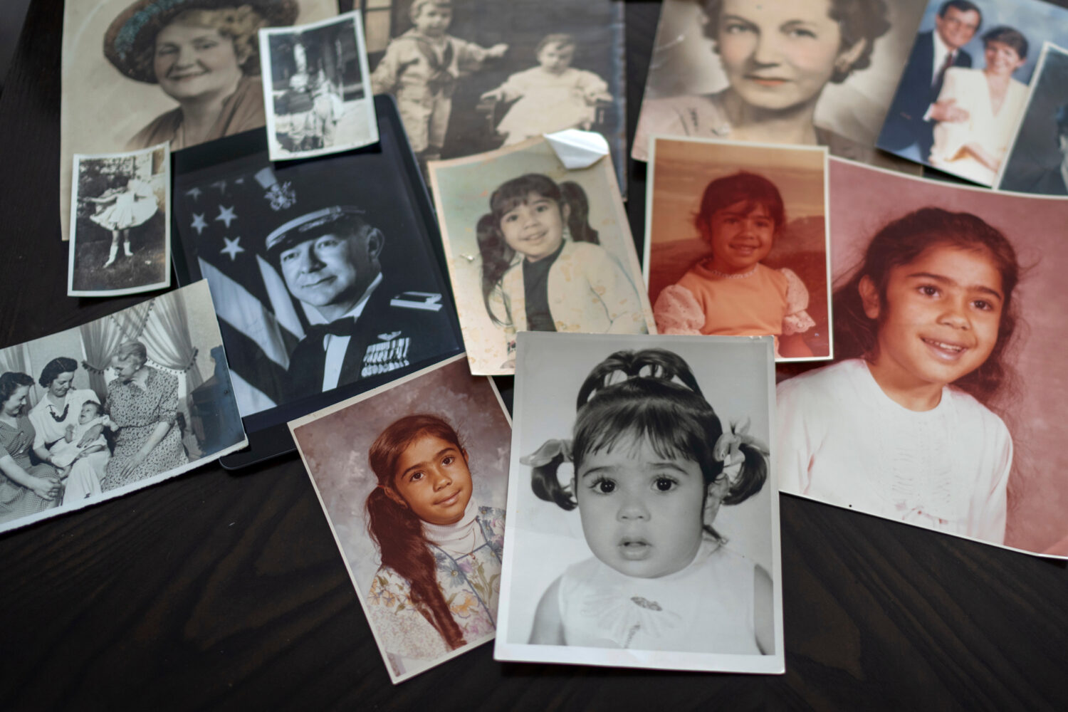 FILE - Childhood photos of a woman adopted as a toddler by an American war veteran, who he found in...