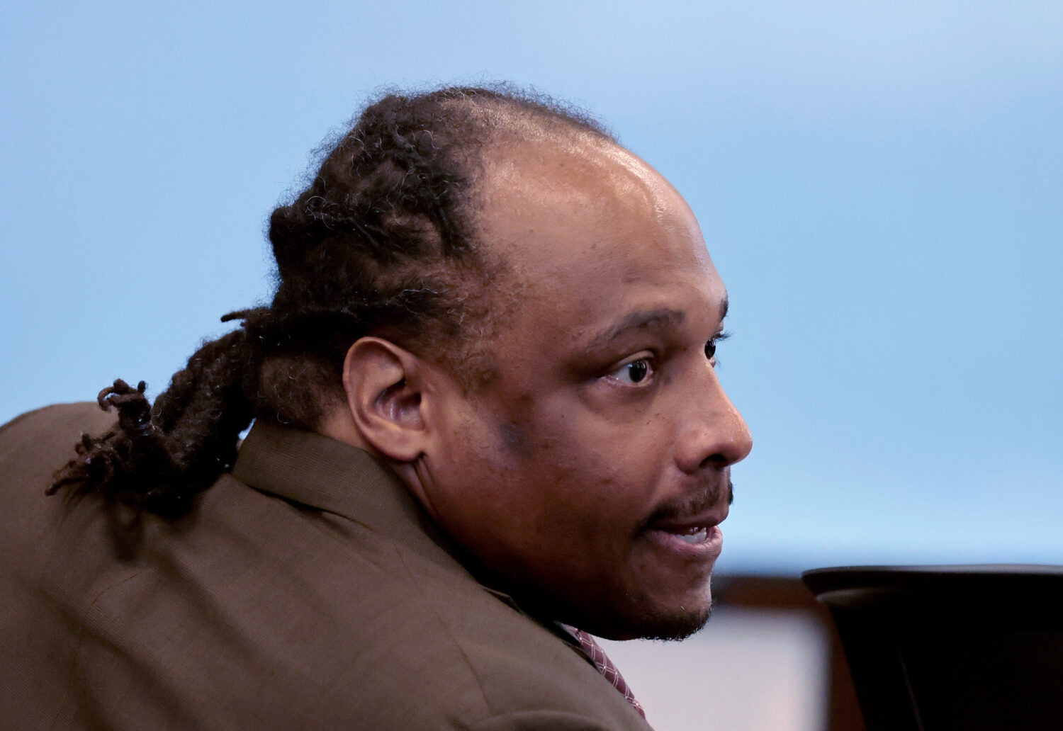 FILE- Alvin Campbell Jr. sits at the defense table during his sexual assault trial, in Suffolk Supe...