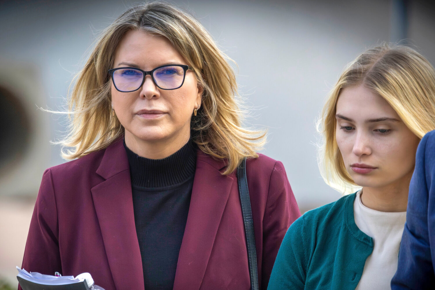 FILE - Rebecca Grossman, left, and her daughter head to Van Nuys Courthouse in the Van Nuys section...