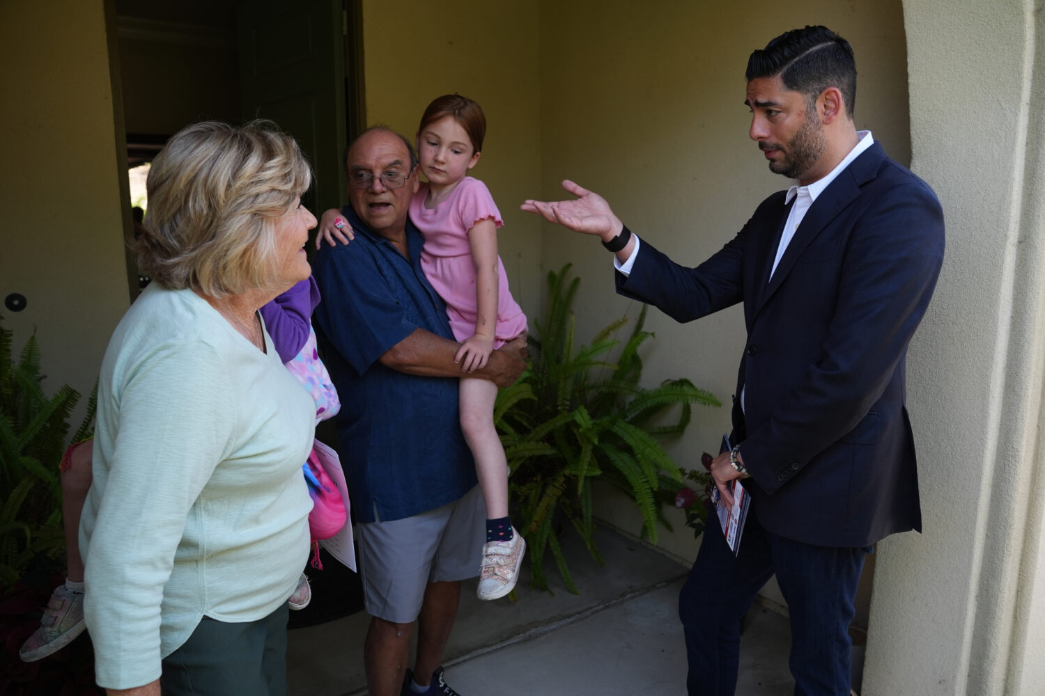 Ammar Campa-Najjar, right, a Democratic candidate for California's 48th Congressional District, spe...