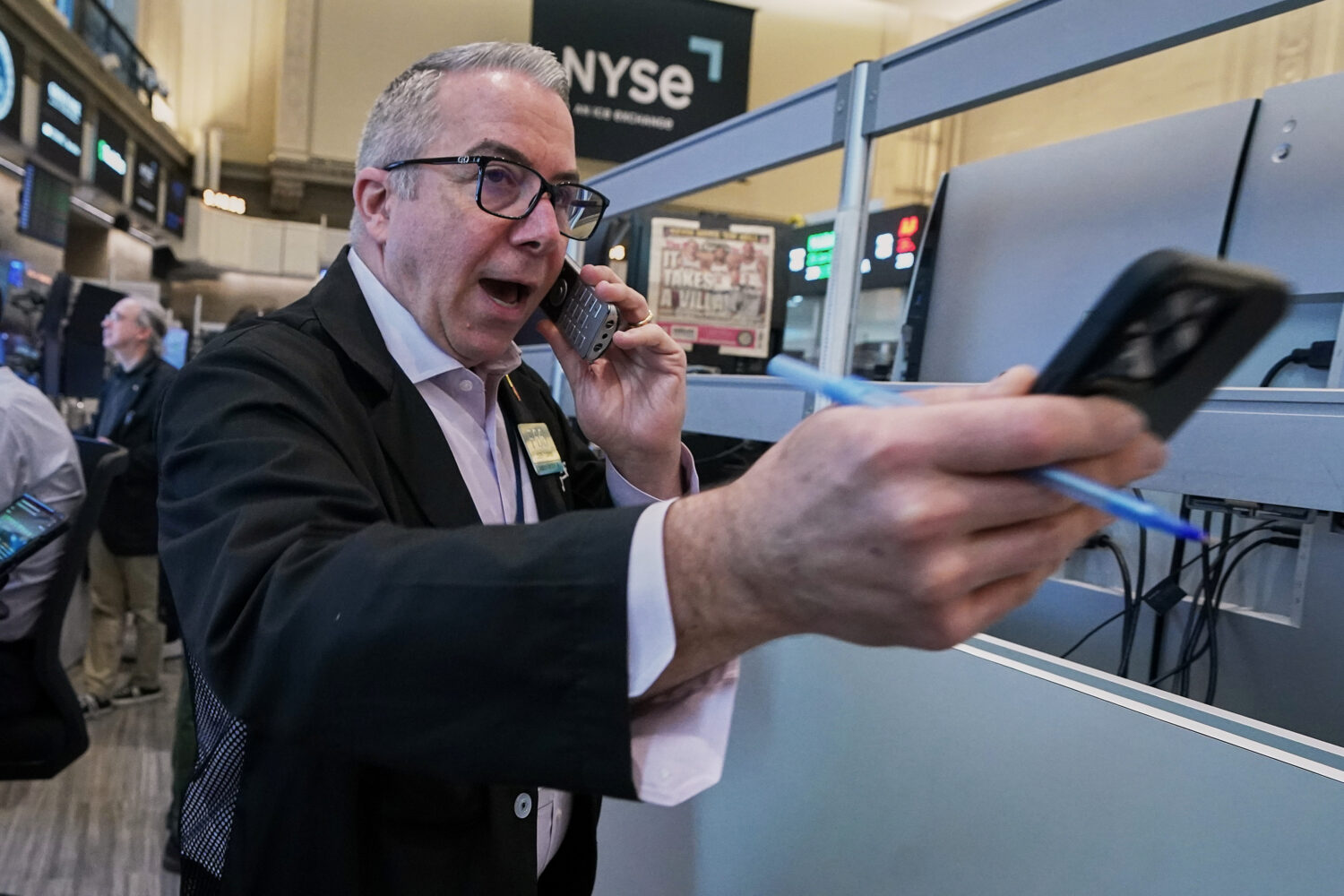 Options trader Joseph D'Arrigo works on the floor of the New York Stock Exchange, Tuesday, June 16,...