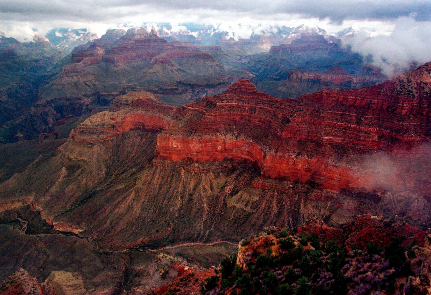 FILE - The Kaibab Trail, running right to left at center, at Grand Canyon National Park on Jan. 20,...