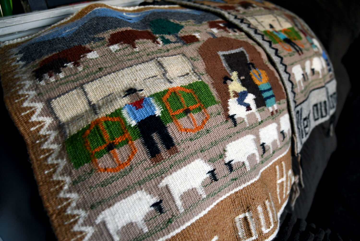 FILE - Weavings created by Ella Mae Begay, who went missing from her home, are displayed in her son...