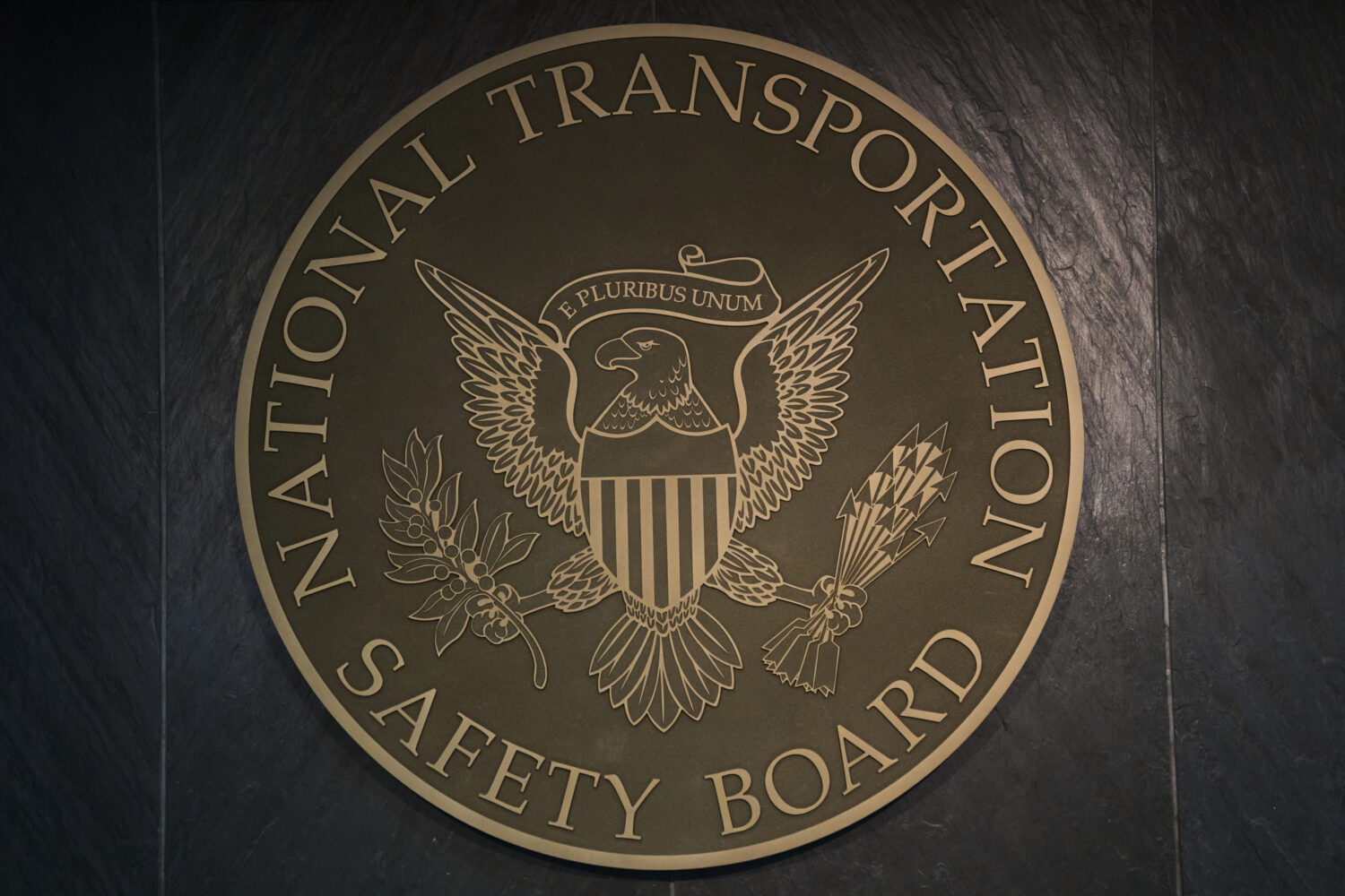 FILE - The seal of the National Transportation Safety Board (NTSB) is displayed in Washington, on J...