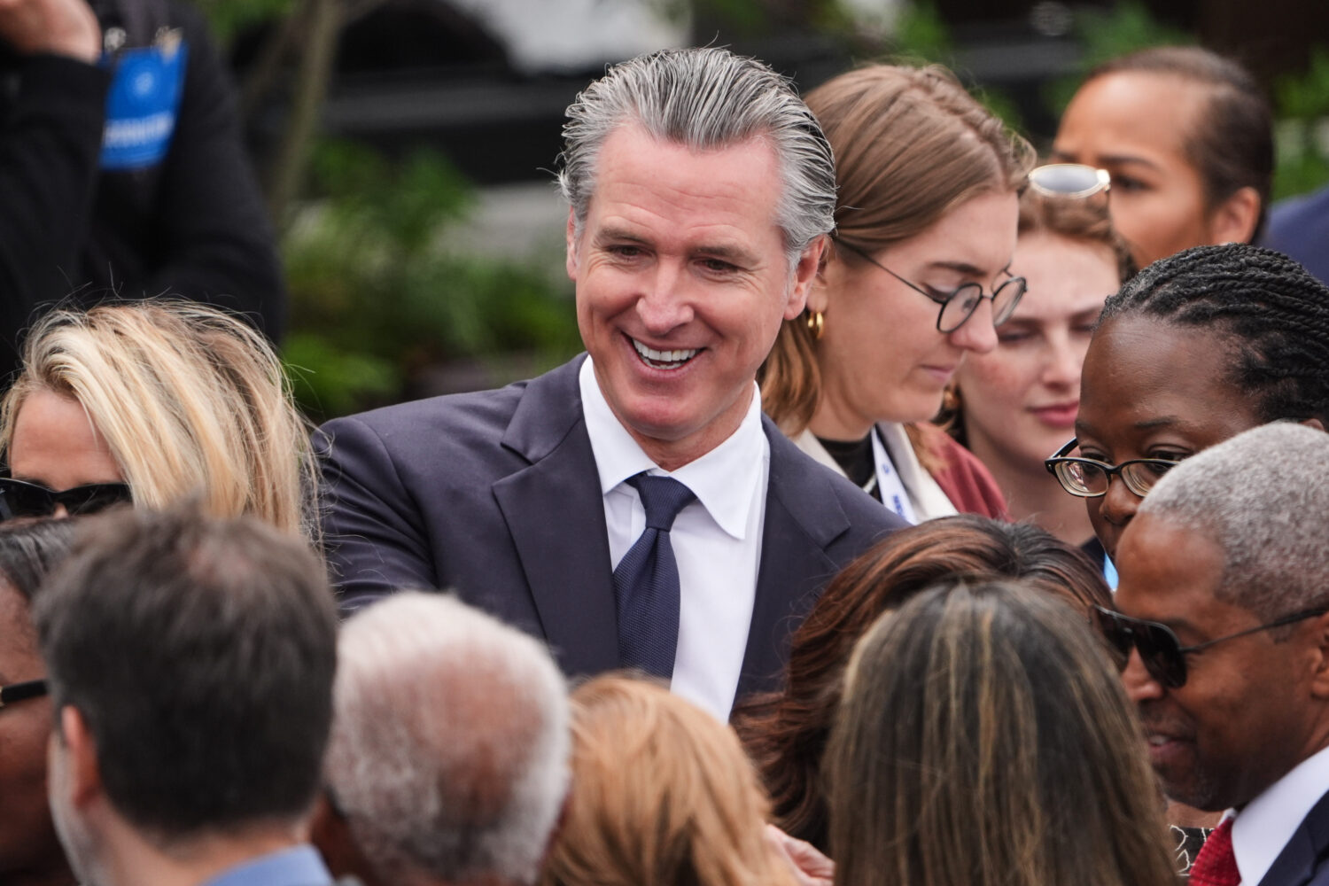 California Gov. Gavin Newsom mingles ahead of the Obama Presidential Center dedication ceremony Thu...