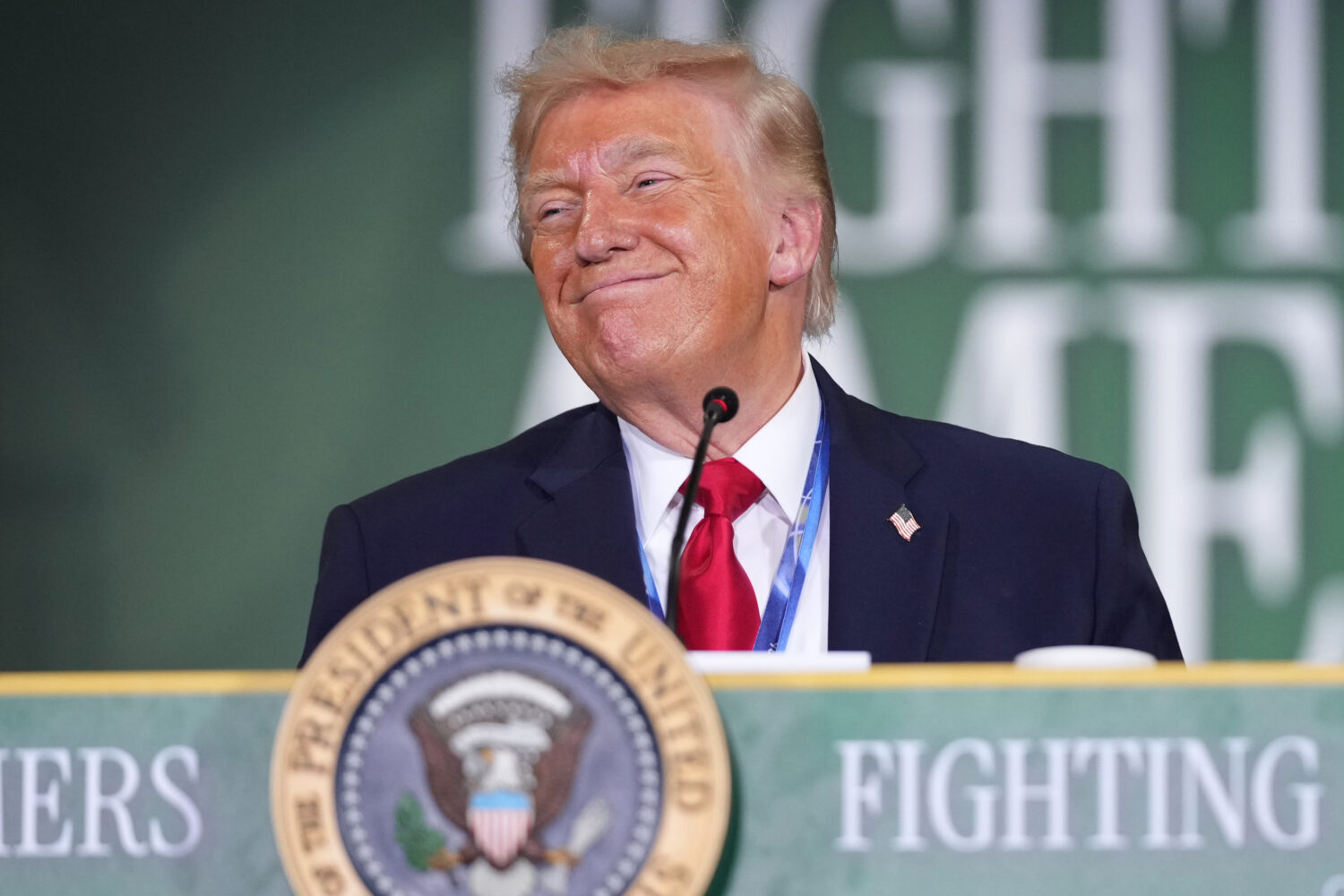 President Donald Trump listens during an event at Custer Farms in Chippewa Falls, Wis., Friday, Jun...