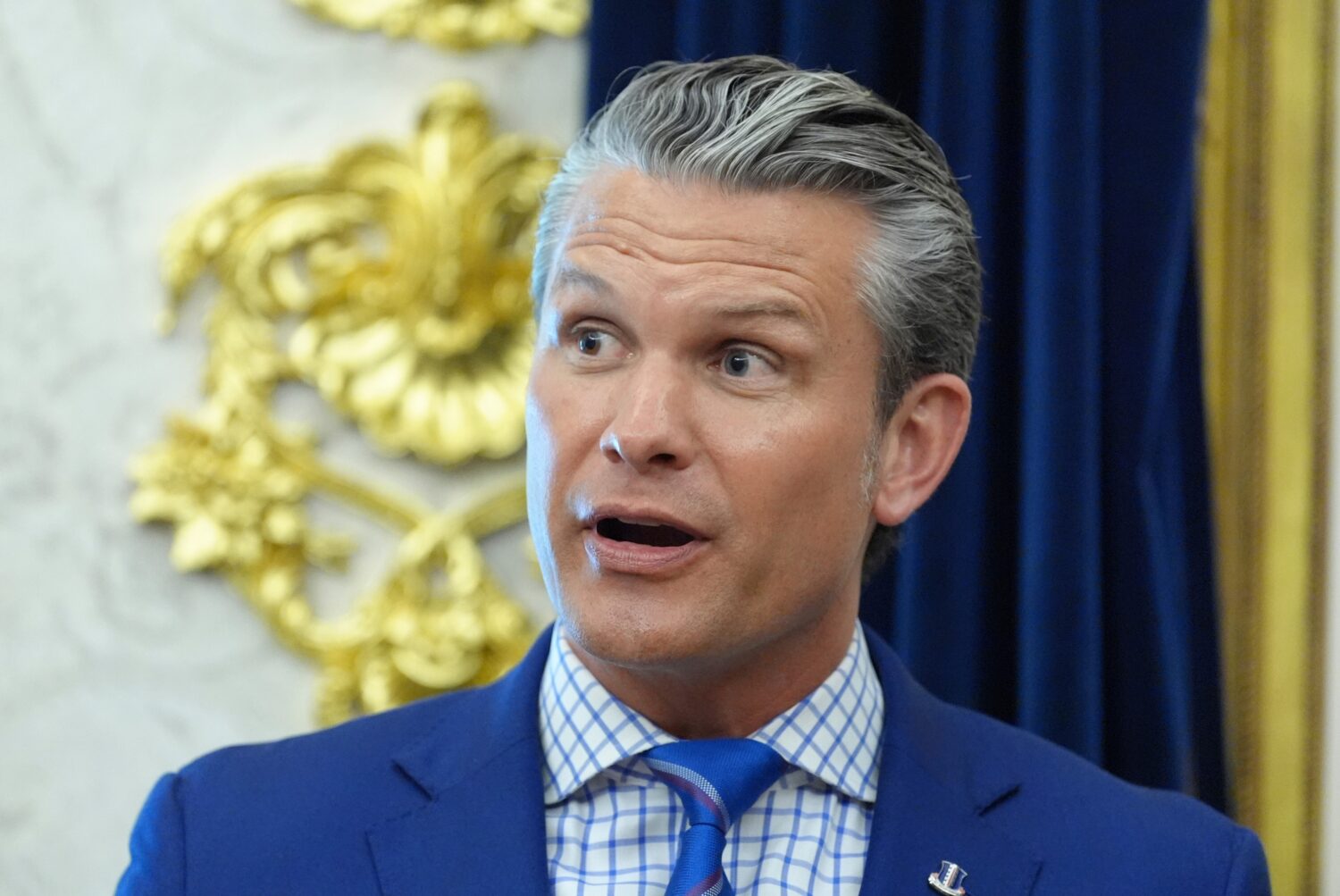 Defense Secretary Pete Hegseth speaks in the Oval Office of the White House during an executive ord...