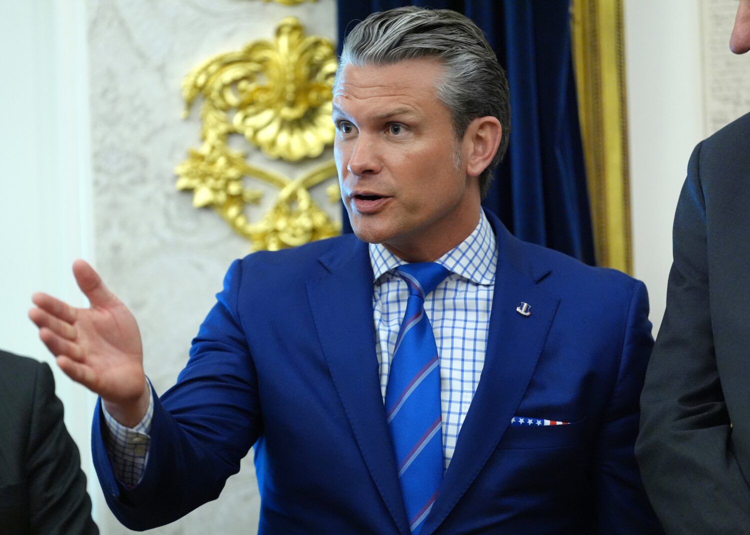 Defense Secretary Pete Hegseth speaks in the Oval Office of the White House during an executive ord...