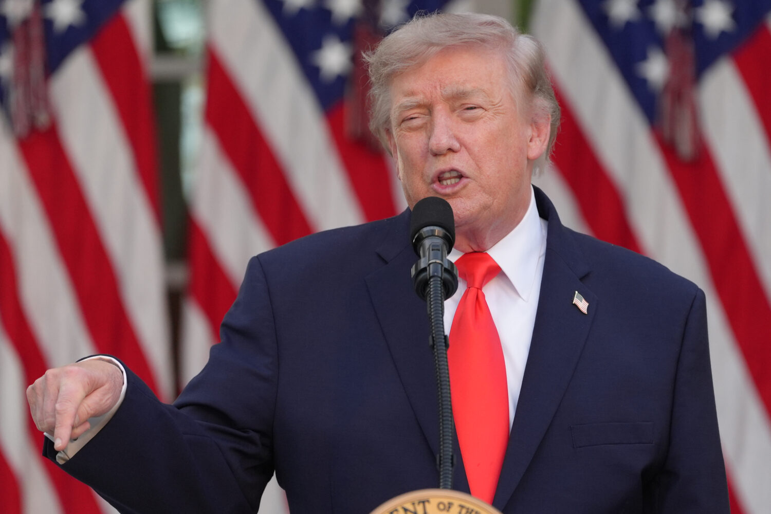 President Donald Trump speaks at a Rose Garden Club dinner with farmers, in the Rose Garden of the ...