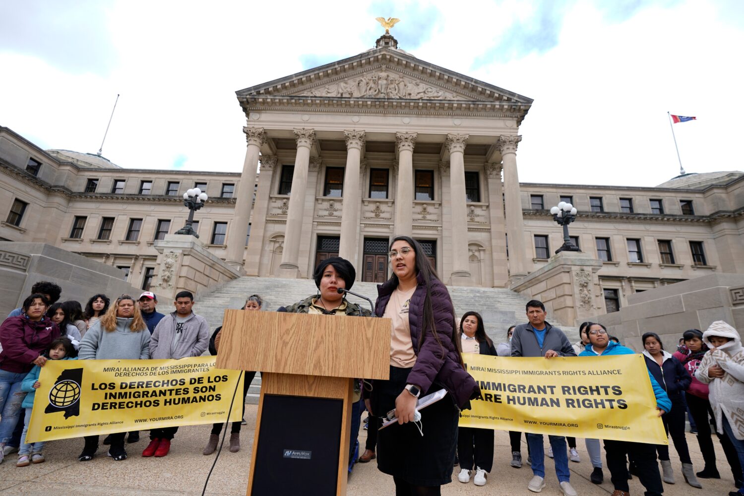 FILE - Yaritza Herrera, left, a young mother in central Mississippi, speaks about her concerns rega...