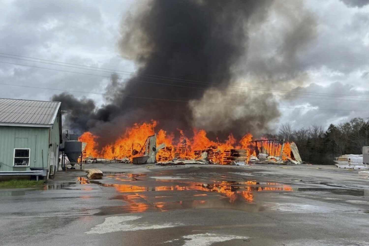 FILE - This photo provided by the Maine Department of Public Safety shows flames from a large fire ...
